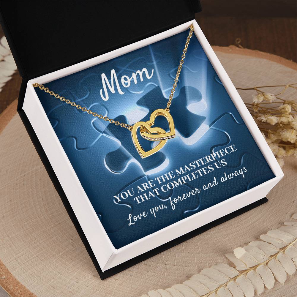 MOM, YOU ARE THE MASTERPIECE THAT COMPLETES US - INTERLOCKING HEARTS NECKLACE