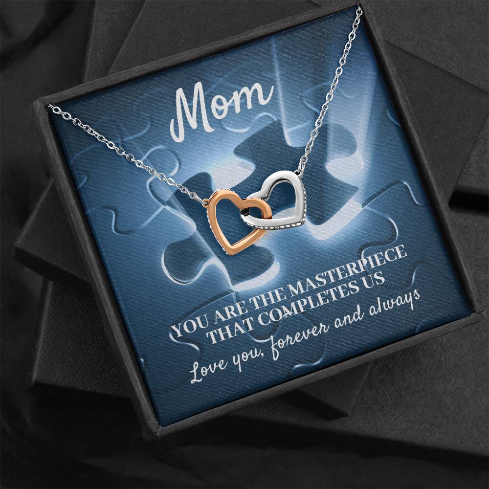 MOM, YOU ARE THE MASTERPIECE THAT COMPLETES US - INTERLOCKING HEARTS NECKLACE