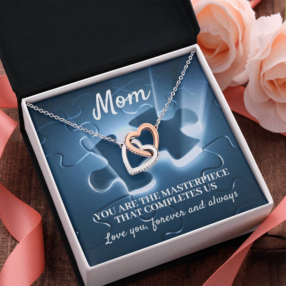 MOM, YOU ARE THE MASTERPIECE THAT COMPLETES US - INTERLOCKING HEARTS NECKLACE