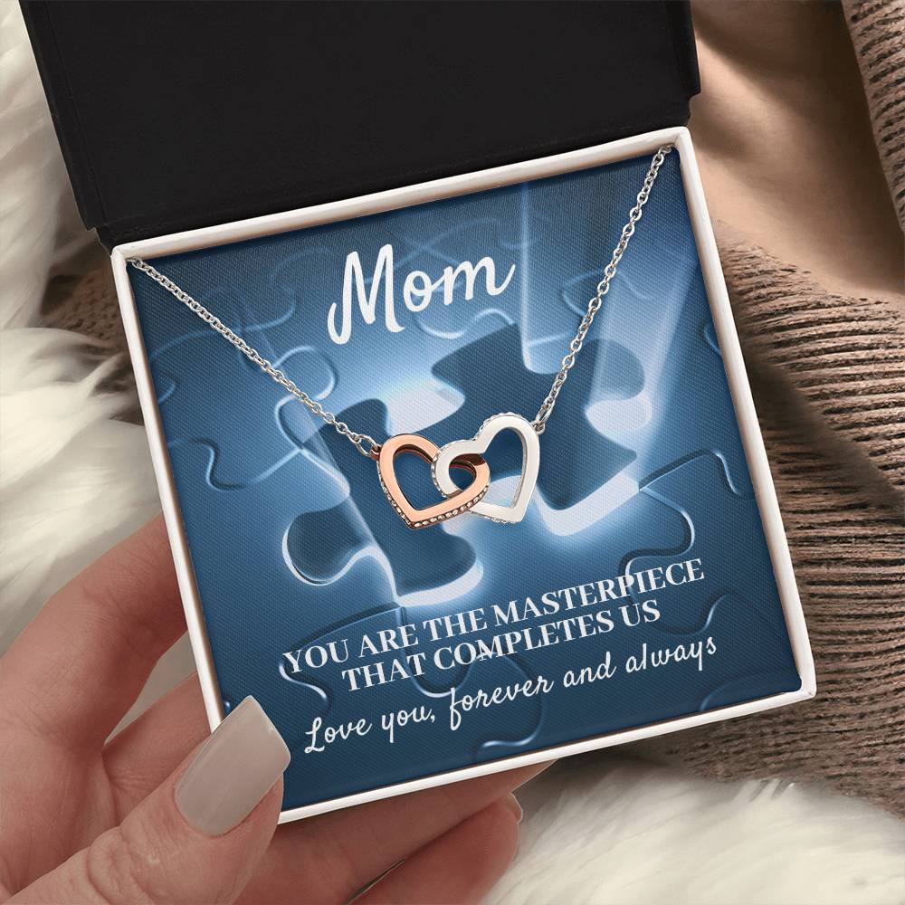 MOM, YOU ARE THE MASTERPIECE THAT COMPLETES US - INTERLOCKING HEARTS NECKLACE