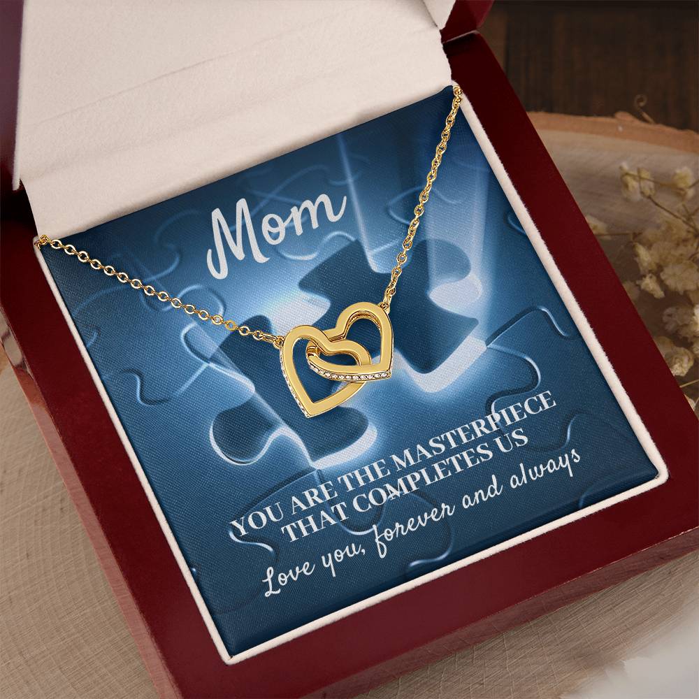 MOM, YOU ARE THE MASTERPIECE THAT COMPLETES US - INTERLOCKING HEARTS NECKLACE